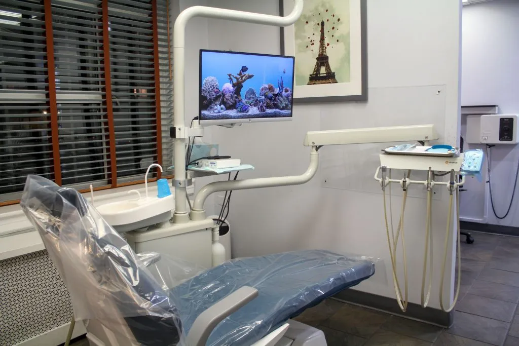 Clean dental exam room with window