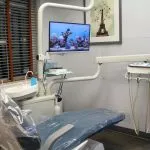Clean dental exam room with window
