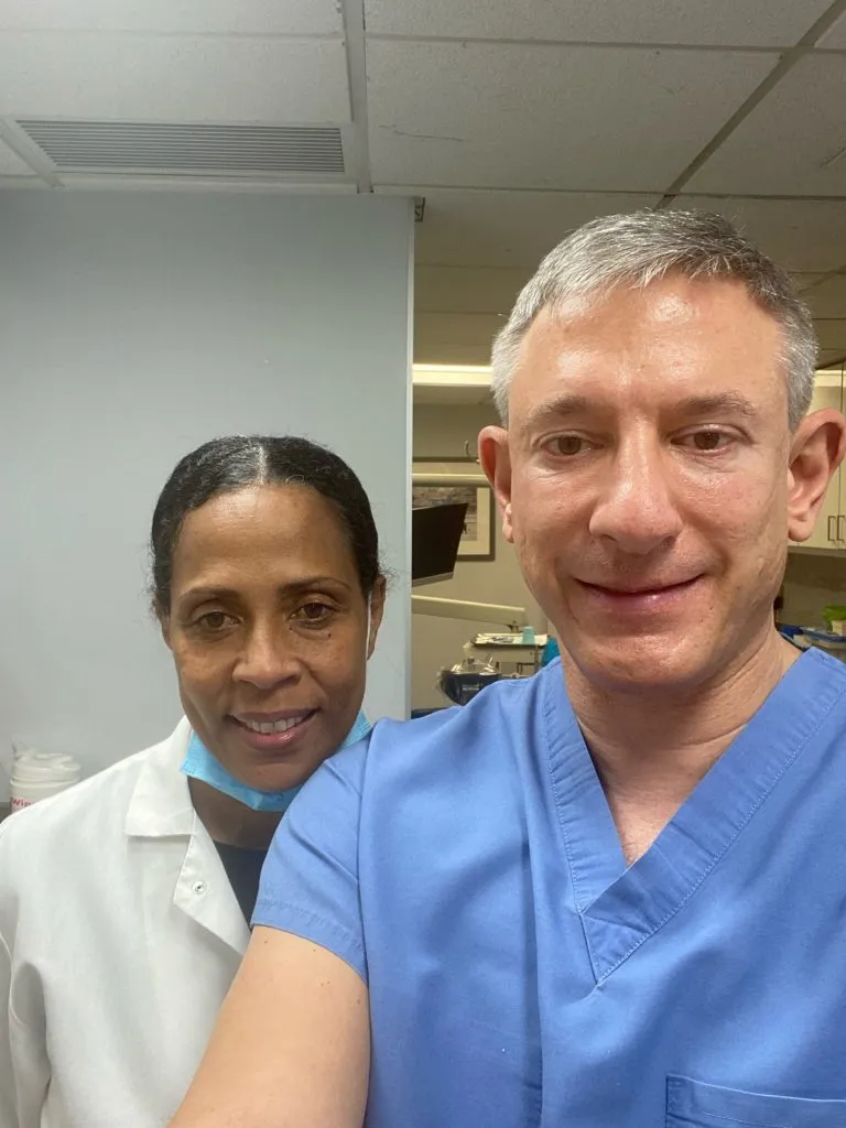 Dr. Kirsch and his dental staff member, Angie
