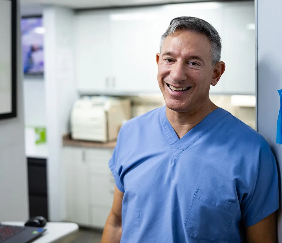 Dr. Kirsch smiling in his dental office