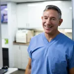 Dr. Kirsch smiling in his dental office